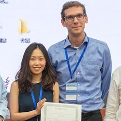 Ruodan Lu and Philipp Hüthwohl (centre)