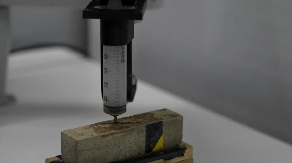 Demonstration of automated crack filling by PhD student Sam Schaefer